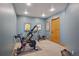 Basement home gym with exercise equipment for a healthy lifestyle at 12421 High Country Trl, Littleton, CO 80127