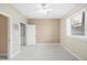 Bright bedroom with a window and closet at 9019 E Panorama Cir # D211, Centennial, CO 80112