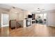 Spacious living room featuring hardwood floors, fireplace, and access to a balcony at 9019 E Panorama Cir # D211, Centennial, CO 80112