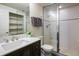 Updated bathroom with walk-in shower and modern vanity at 1366 Teton Pt, Lafayette, CO 80026