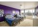 Spacious bedroom with two twin beds and large window at 1366 Teton Pt, Lafayette, CO 80026