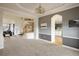 Elegant dining room features neutral tones and a view to the kitchen at 1366 Teton Pt, Lafayette, CO 80026