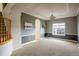 Spacious dining room with neutral decor and natural light at 1366 Teton Pt, Lafayette, CO 80026