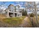 Two-story home with stone accents and deck at 1366 Teton Pt, Lafayette, CO 80026