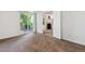 Bright bedroom with carpet and access to a balcony at 8813 Colorado Blvd # 207, Thornton, CO 80229