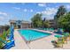 Inviting community pool with ample lounge chairs and a shaded seating area at 8813 Colorado Blvd # 207, Thornton, CO 80229