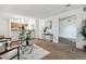 Open concept living room with kitchen and dining area at 8813 Colorado Blvd # 207, Thornton, CO 80229