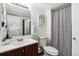 Clean bathroom with a single vanity and shower/tub combo at 8813 Colorado Blvd # 207, Thornton, CO 80229