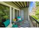 Private balcony with seating and view of trees at 8813 Colorado Blvd # 207, Thornton, CO 80229