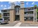 Exterior view of a two-story condo building at 8813 Colorado Blvd # 207, Thornton, CO 80229