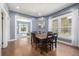 Dining room with hardwood floors and large windows at 3145 W 23Rd Ave, Denver, CO 80211