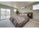 Spacious bedroom with large window and balcony access at , Commerce City, CO 80022