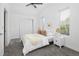 Bedroom with a double bed, nightstand, and ample closet space at 1473 Yates St, Denver, CO 80204