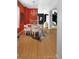 Dining room with hardwood floors, a round table, and modern chairs at 1473 Yates St, Denver, CO 80204