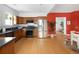 Modern kitchen with stainless steel appliances and granite countertops at 1473 Yates St, Denver, CO 80204