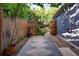 Backyard with a patio and access gate at 1473 Yates St, Denver, CO 80204