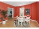 Bright dining area with a round table and white chairs at 1473 Yates St, Denver, CO 80204