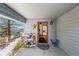 Front entry with access to interior and backyard at 420 Chinook Rd, Idaho Springs, CO 80452