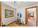 Bright entryway with coat rack and view into living area at 420 Chinook Rd, Idaho Springs, CO 80452