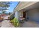 Inviting home exterior with a covered porch and mountain views at 420 Chinook Rd, Idaho Springs, CO 80452