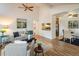 Open dining area with hardwood floors and kitchen passthrough at 2970 W 119Th St, Westminster, CO 80234