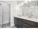 Modern bathroom with double vanity and shower at 461 Interlocken Blvd # 104, Broomfield, CO 80021