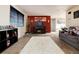 Spacious living area with a fireplace and an accent wall at 22381 E Oberlin Dr, Aurora, CO 80018