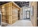 Stylish lobby with elevator, wood paneling, and modern fixtures at 3575 Chestnut Pl # 704, Denver, CO 80216