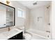 Clean bathroom, featuring a bathtub and modern vanity at 4121 Kalamath St, Denver, CO 80211