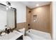 Stylish bathroom with a walk-in shower and modern tile at 4121 Kalamath St, Denver, CO 80211