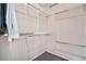 Large walk-in closet with hanging rods and shelves at 16264 Orchard Grass Ln, Parker, CO 80134