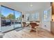 Bright breakfast nook with view to backyard deck and patio at 9353 Wiltshire Dr, Highlands Ranch, CO 80130