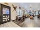 Spacious living room features hardwood floors, a leather sofa, and a wood coffee table at 2730 Miner St, Idaho Springs, CO 80452