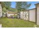 Backyard with shed, small tools, and woodpile at 2730 Miner St, Idaho Springs, CO 80452