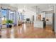 Spacious kitchen with large island, stainless steel appliances and hardwood floors at 29775 E 162Nd Ave, Brighton, CO 80603