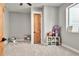 Spacious bedroom with neutral walls and plenty of natural light at 29775 E 162Nd Ave, Brighton, CO 80603