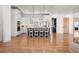Spacious kitchen with island, stainless steel appliances, and hardwood floors at 29775 E 162Nd Ave, Brighton, CO 80603