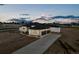 Modern home exterior with attached garage and landscaping at 29775 E 162Nd Ave, Brighton, CO 80603