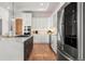 Modern kitchen with stainless steel appliances and marble countertops at 29775 E 162Nd Ave, Brighton, CO 80603