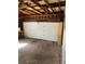 Spacious garage with overhead door and ample storage at 2792 S Macon Cir, Aurora, CO 80014