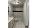 Bathroom with a shower/tub combo and white tile at 2792 S Macon Cir, Aurora, CO 80014