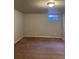 Spacious finished basement room with carpet and window at 2792 S Macon Cir, Aurora, CO 80014