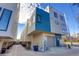 Rear view of modern townhomes with private garages at 4364 W 29Th Ave, Denver, CO 80212