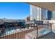 View from balcony showcases a community pool and city skyline at 1020 15Th St # 7A, Denver, CO 80202