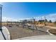 Community playground with swings, climbing structures, and slides at 60 S Trussville St, Aurora, CO 80018