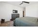 Bright bedroom with a dresser and TV, offering ample space at 60 S Trussville St, Aurora, CO 80018