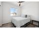Well-lit bedroom with a double bed and nightstand at 60 S Trussville St, Aurora, CO 80018