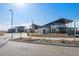 Modern community center with large windows and outdoor seating at 60 S Trussville St, Aurora, CO 80018