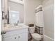 Simple bathroom with a single vanity, shower/tub combo at 60 S Trussville St, Aurora, CO 80018