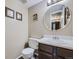 Clean bathroom with a vanity and large mirror at 750 Tabor St # 63, Lakewood, CO 80401